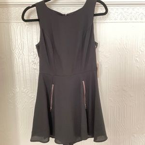 Flirty Black Romper with Rose Gold Zipper Pockets